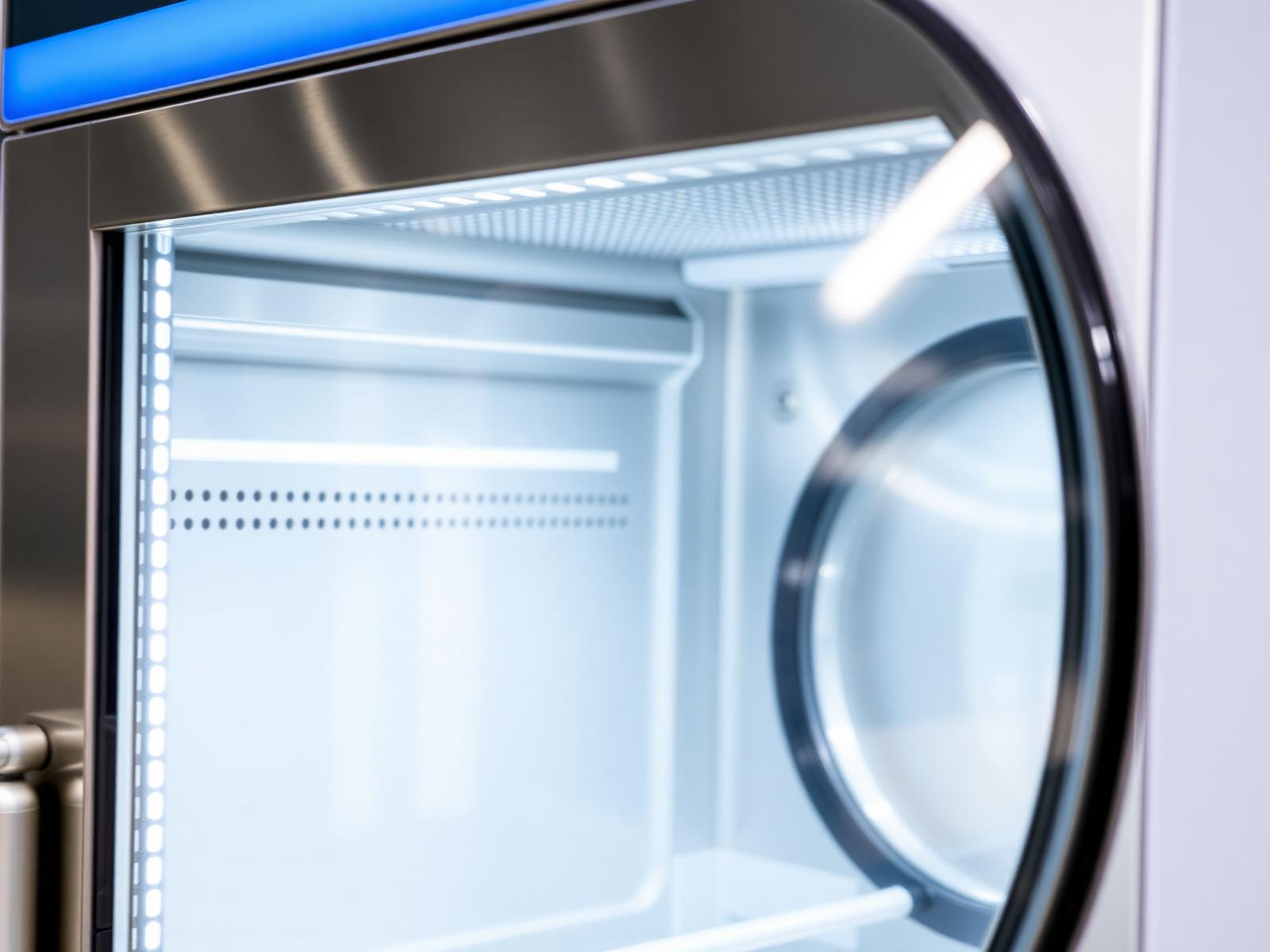 Close-up of a commercial glass-door display cooler with LED interior lighting